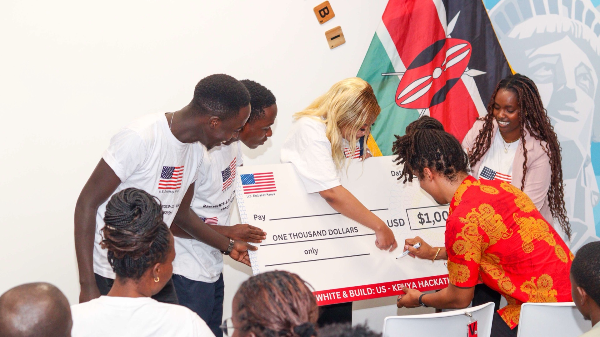 Hackathon winners receiving grand prize