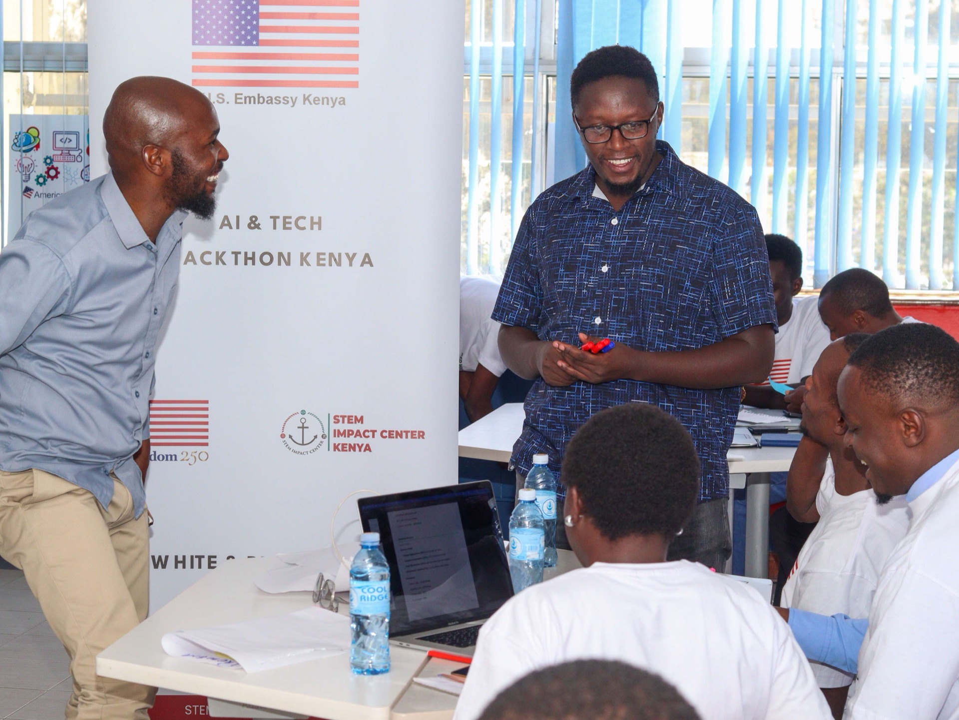 Mentors guiding startup teams